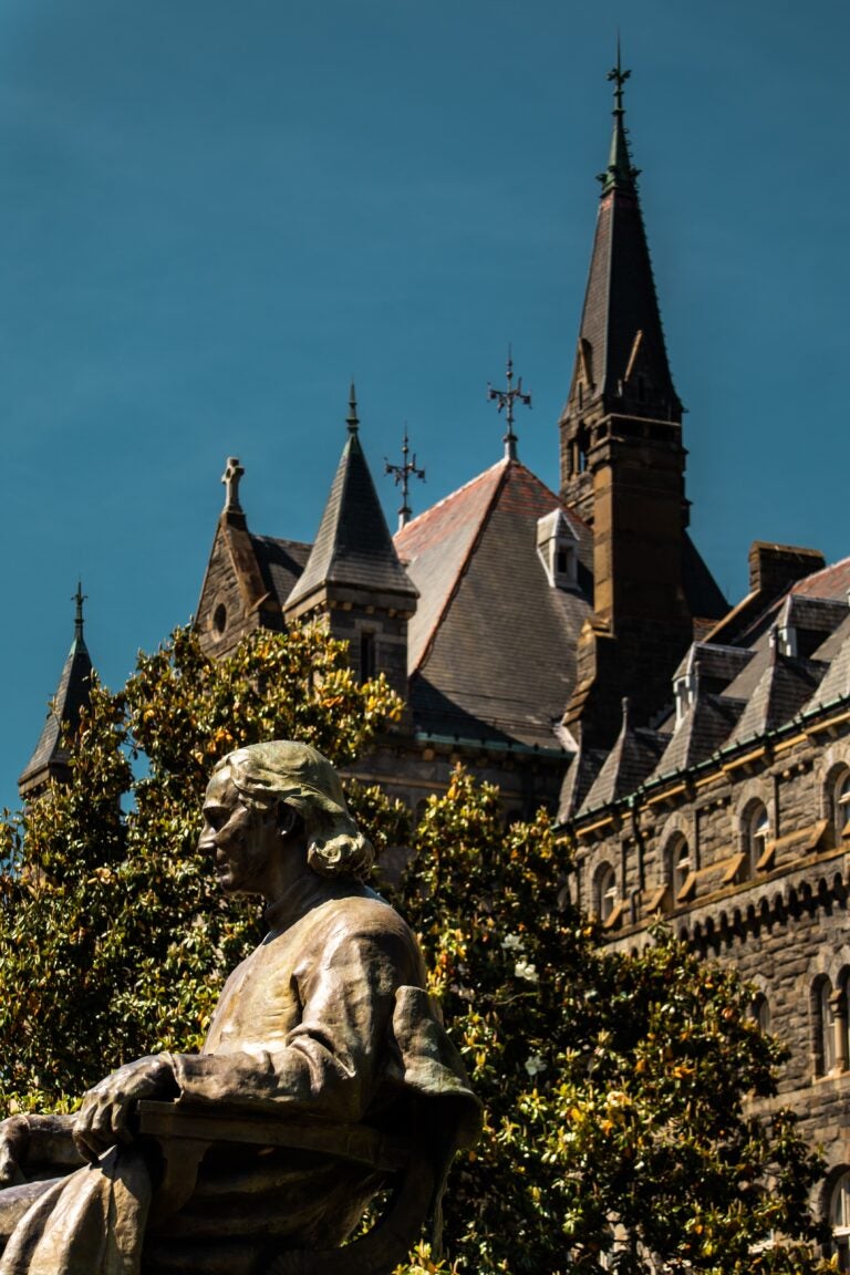 View of Healy Hall and John Carroll statue